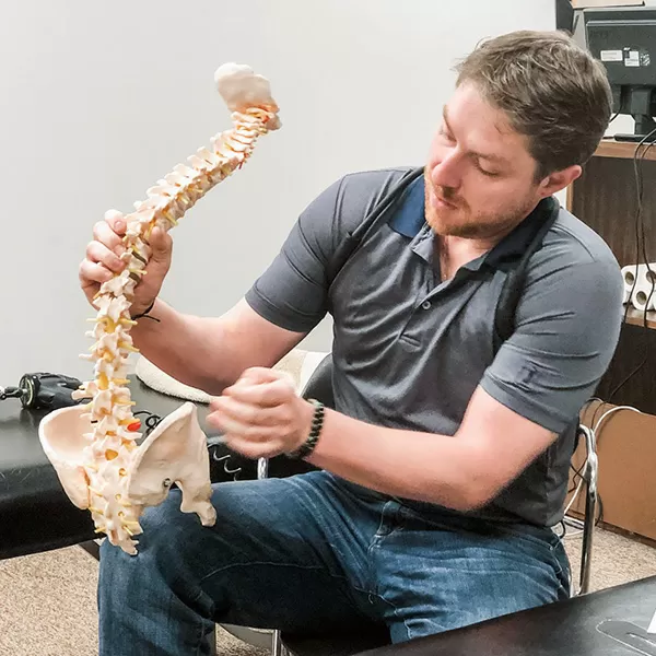 Chiropractor Lake in the Hills IL Cameron Gilbert Showing Spine